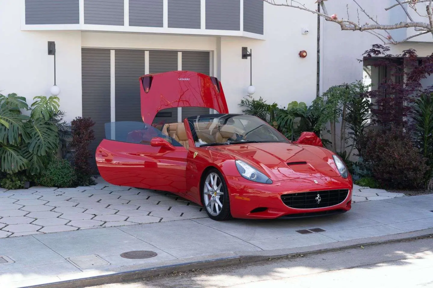 Freshly detailed red Ferrari, kept finished on a maintenance plan
