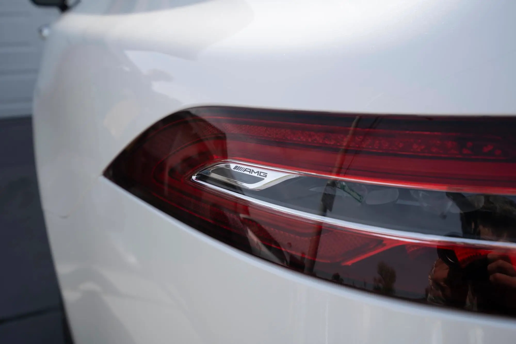 Mercedes-AMG GT 43 taillight and AMG badge closeup