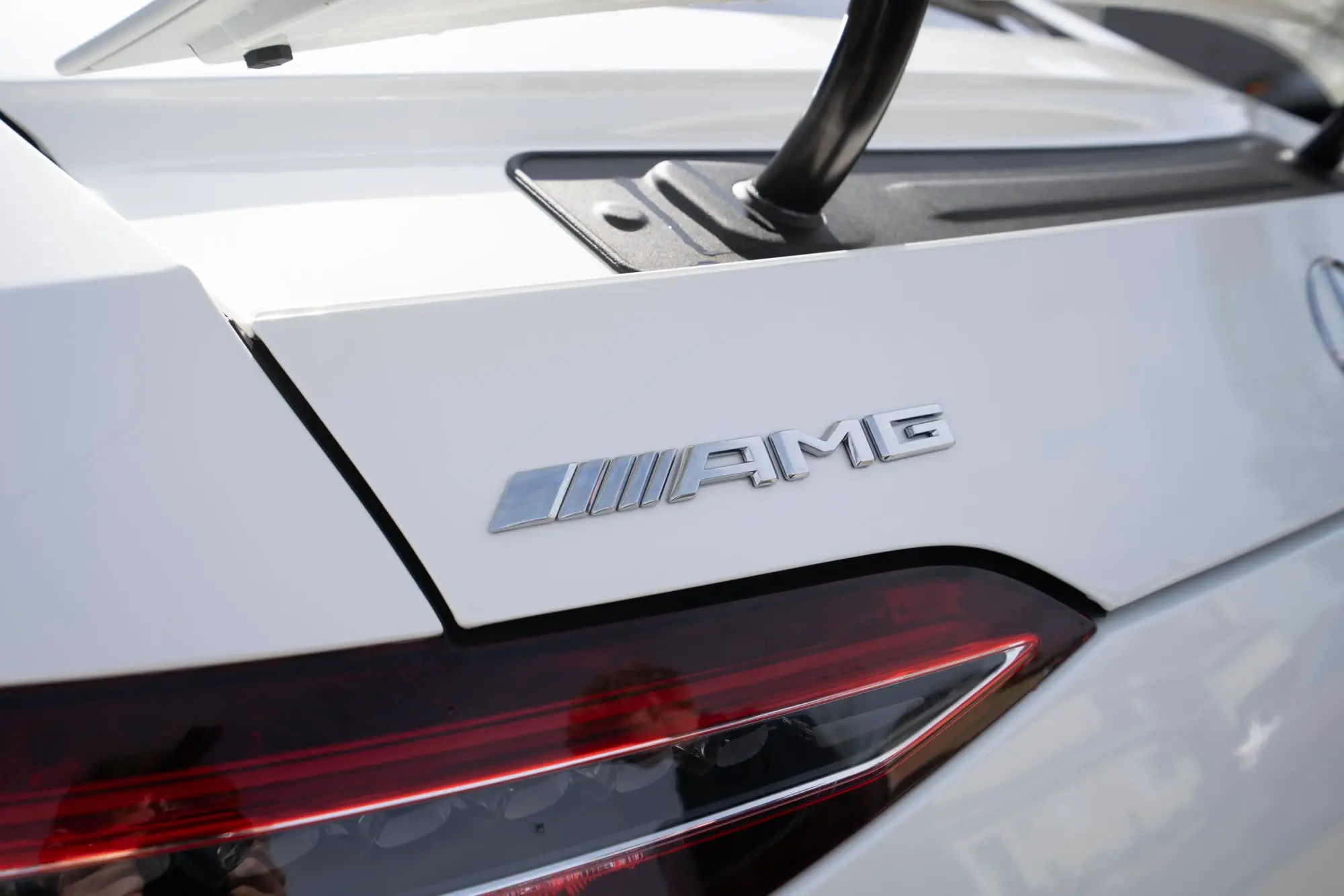 Mercedes-AMG GT 43, AMG badge closeup on rear deck