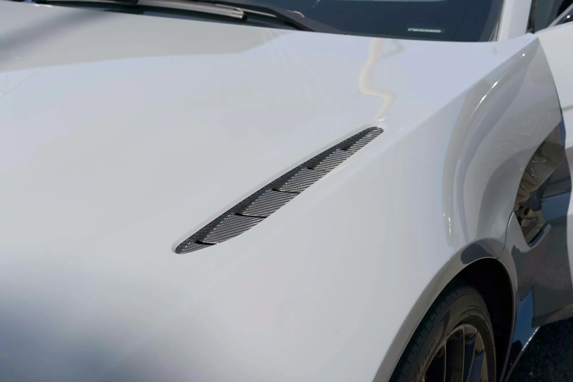 Aston Martin Vantage front fender vent and glossy hood