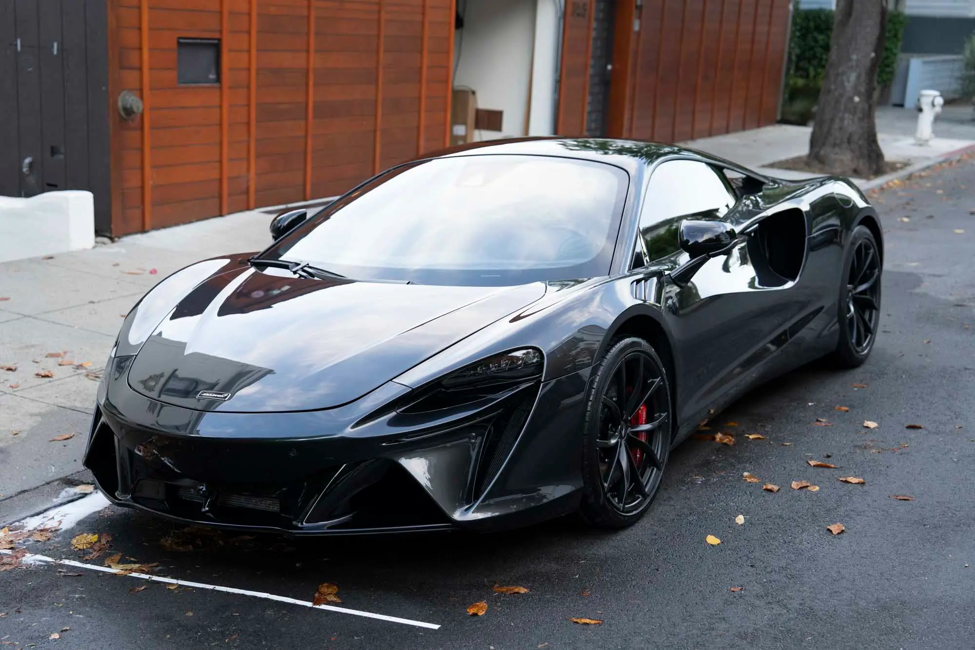 Black McLaren Artura on a San Francisco street after a detail