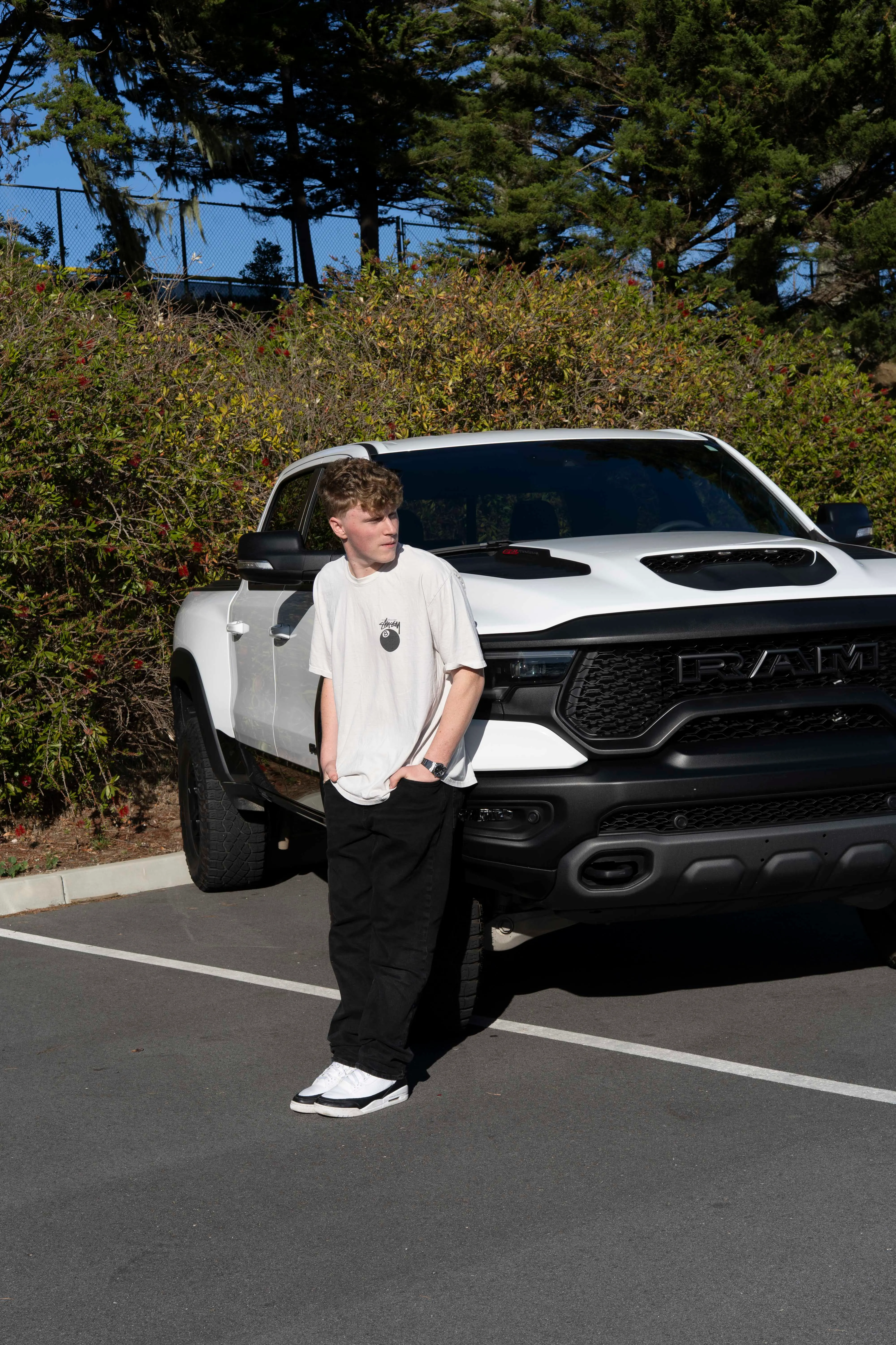 Moses beside a freshly detailed RAM TRX