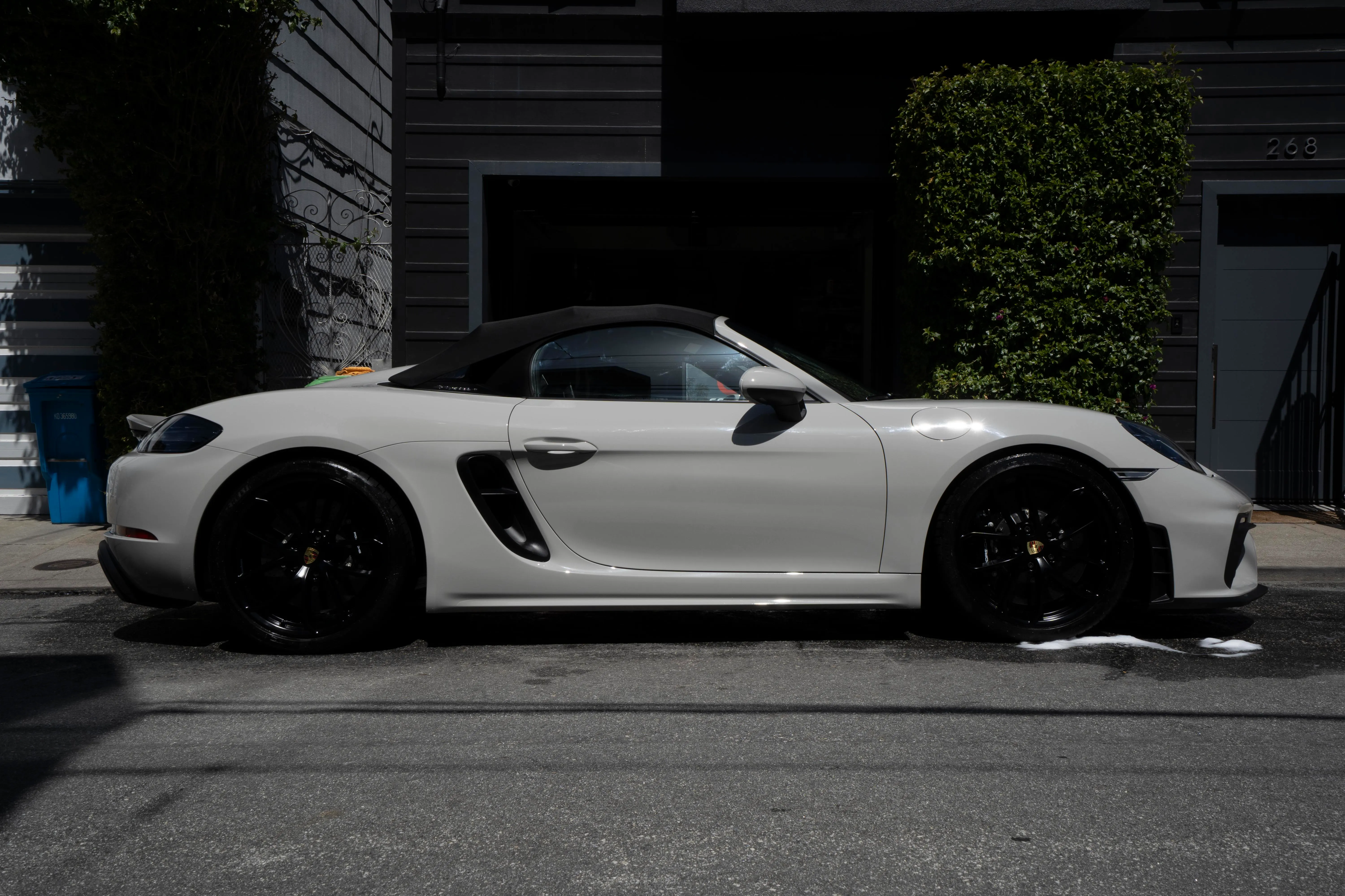 Cole’s crew detailing a Porsche 718 Spyder at a client’s San Francisco home
