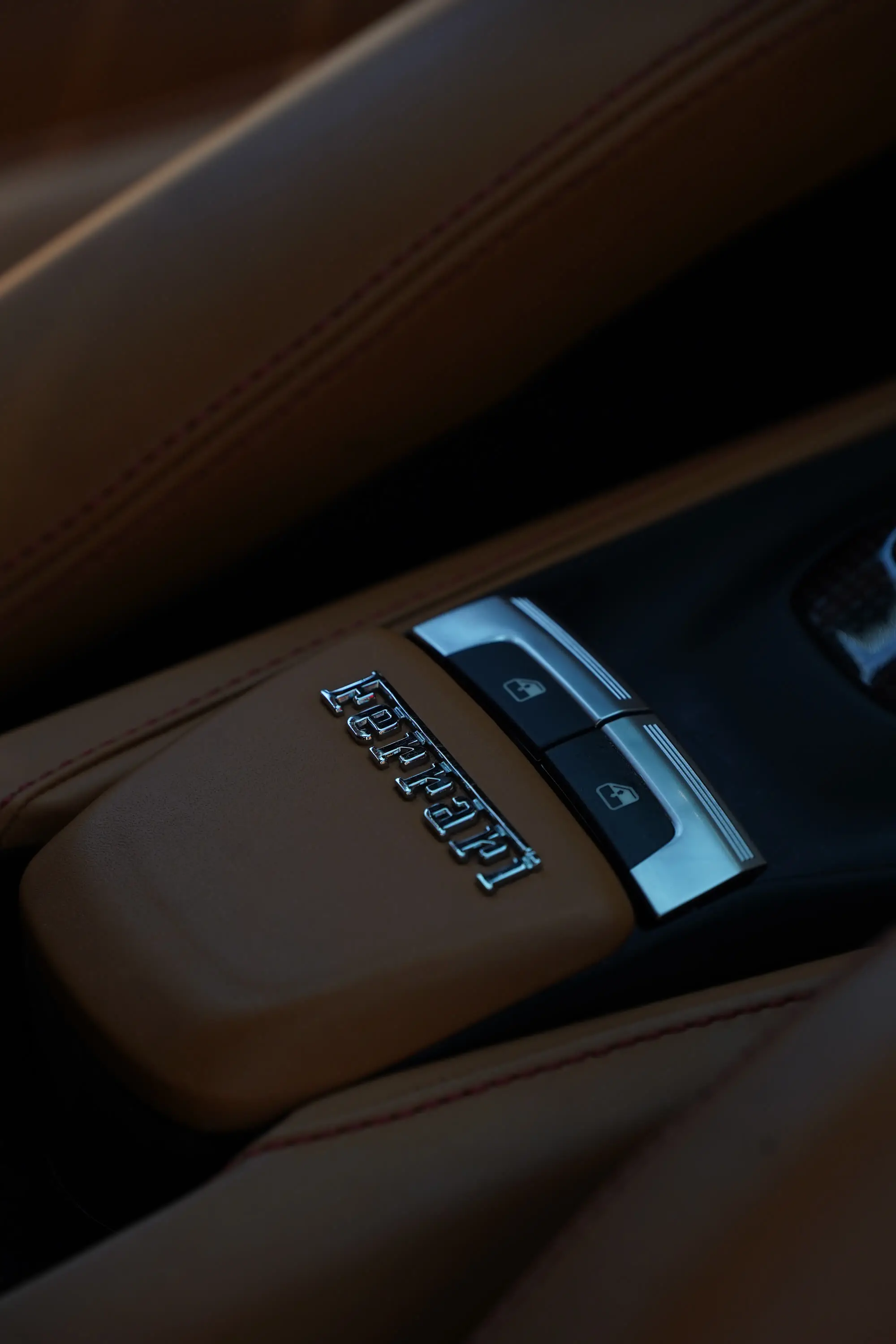 Ferrari 488 GTB, Ferrari center console with tan leather and Ferrari plaque