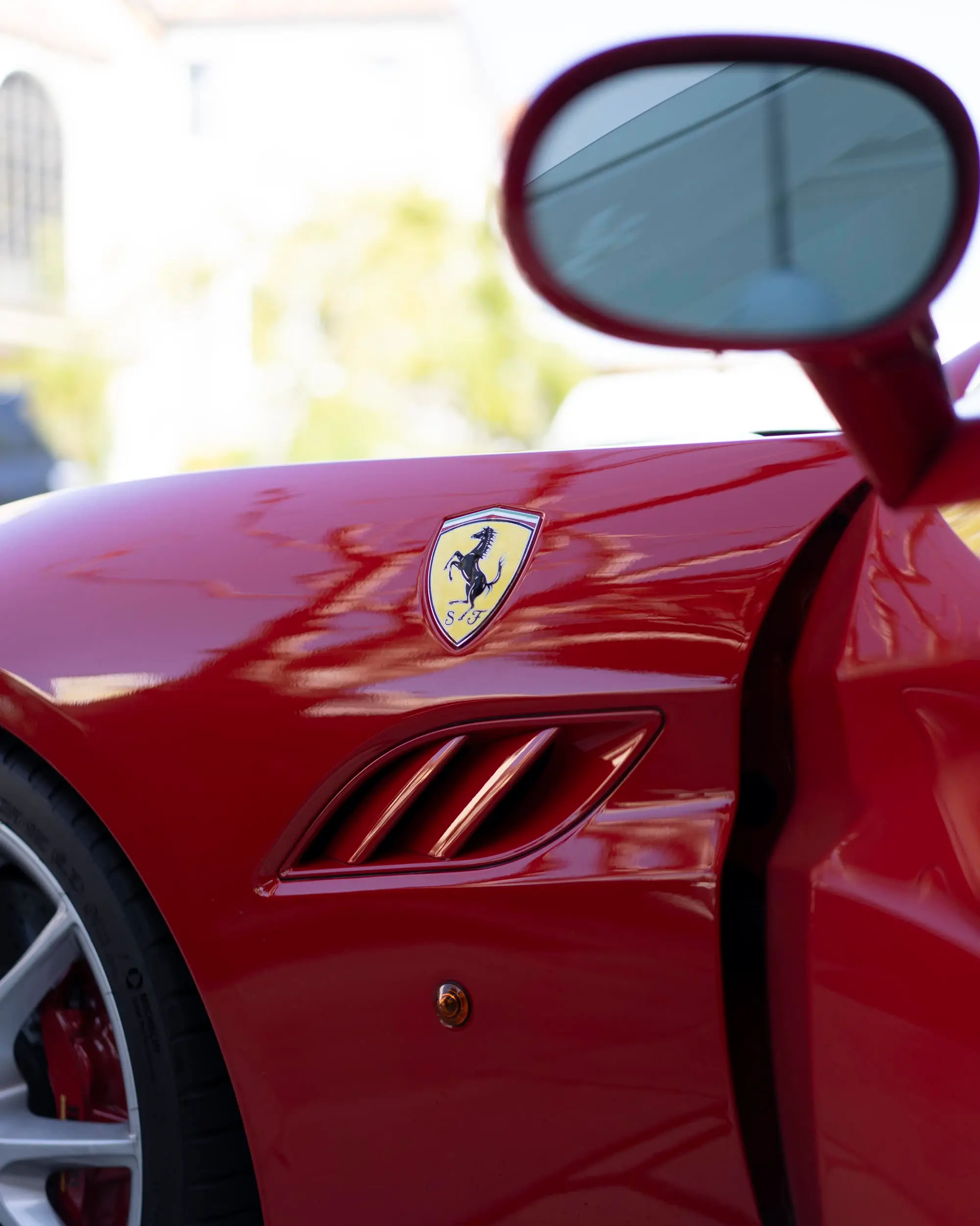 Ferrari California fender shield, vent, and mirror