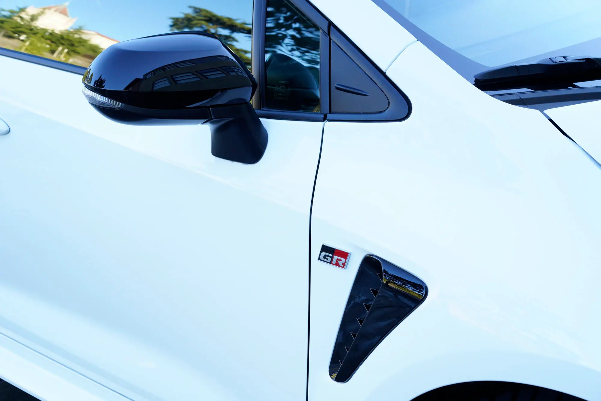 Toyota GR Corolla mirror, quarter window, GR badge