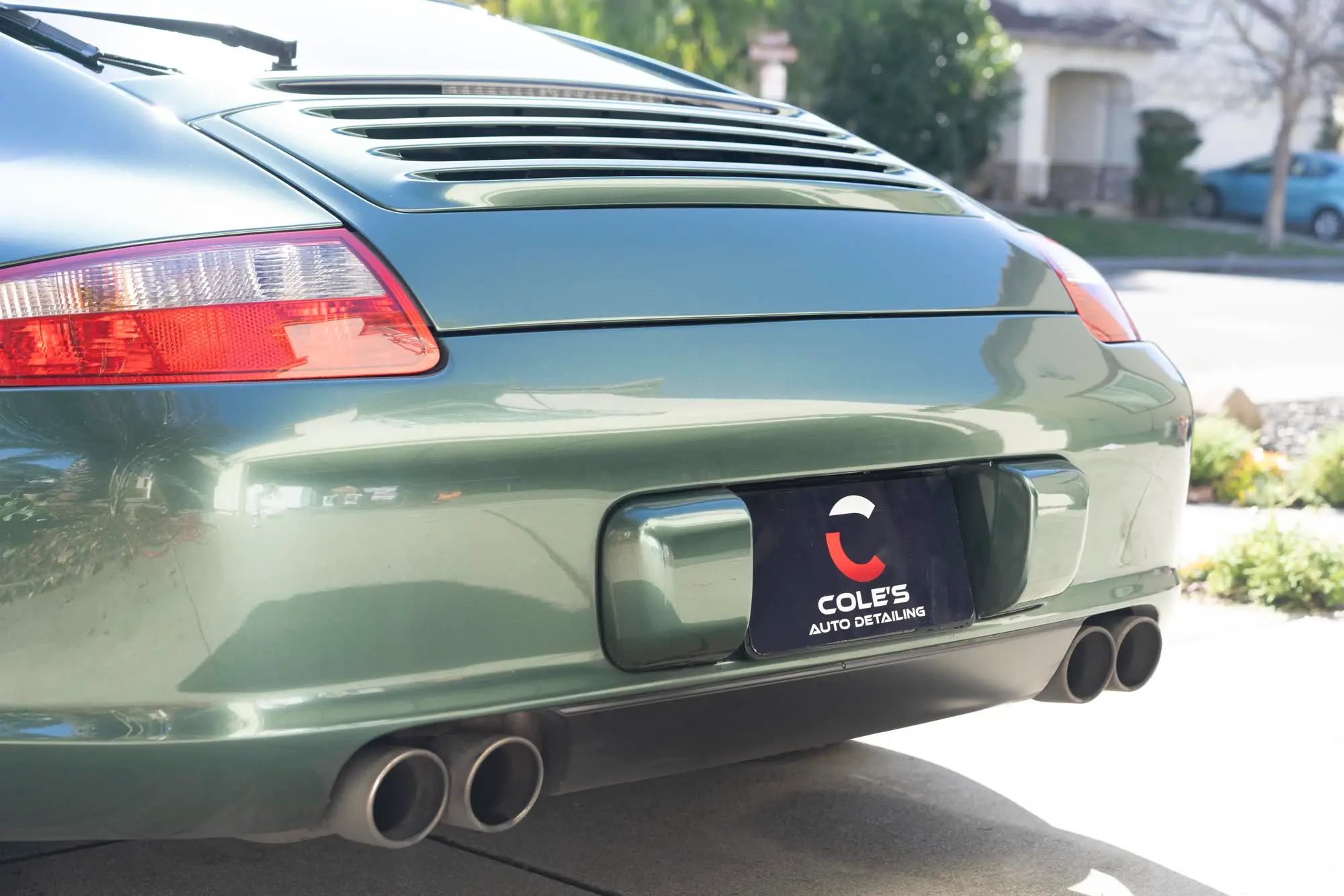 Porsche 911 (997) rear with Cole's Auto Detailing plate banner