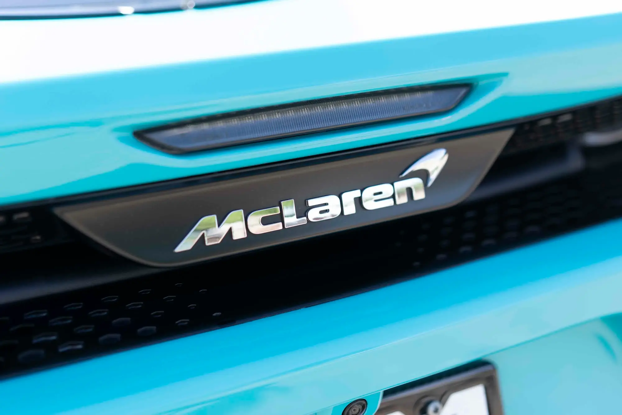 McLaren 720S, McLaren rear badge on turquoise GT